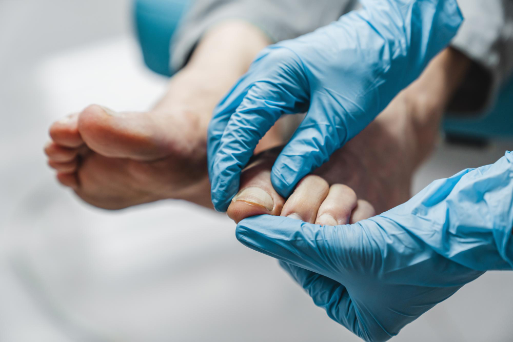 https://nailsurgeryclinic.ie/wp-content/uploads/2023/08/podiatrist-treating-feet-during-procedure-1.jpg